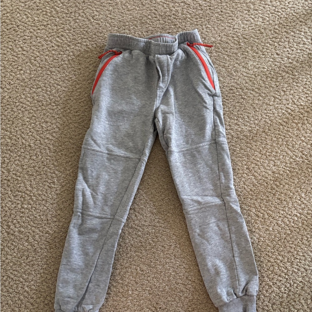 Mini Boden Gray Kids Jogger Pants with Red Accents.